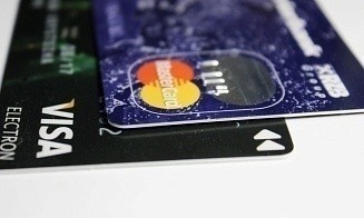 Visa и Mastercard увеличат комиссии для транзакций по банковским картам
