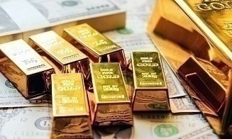Стоит ли покупать золото и когда начнет дорожать доллар. Что показал индекс инвестора в мае