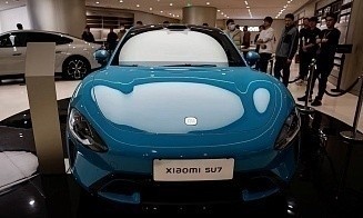 Xiaomi привлекла $5,5 млрд через Гонконгскую биржу на электромобили